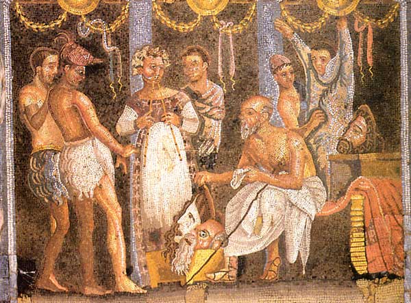 Cette mosaque romaine montre la prparation du spectacle dans les coulisses du thtre.Chaque acteur se vt et choisit le masque qui va symboliser et dfinir le ou les personnages qu'il interprte dans la pice.